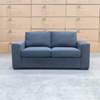 The Oakland Two Seater Metal Action Sofa Bed - Charcoal available to purchase from Warehouse Furniture Clearance at our next sale event.