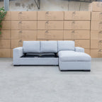 The Oakland Sofa Bed with RHF Storage Chaise - Silver available to purchase from Warehouse Furniture Clearance at our next sale event.