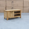 The Rae Small TV Unit - Natural - RA-STV-NAT available to purchase from Warehouse Furniture Clearance at our next sale event.
