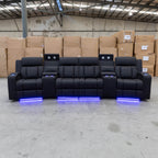 The Remi Four Seat Dual-Motor Electric Recliner Lounge - Jet - Floor Stock available to purchase from Warehouse Furniture Clearance at our next sale event.