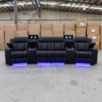 The Remi Four Seat Dual-Motor Electric Recliner Lounge - Jet - Floor Stock available to purchase from Warehouse Furniture Clearance at our next sale event.