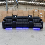 The Remi Four Seat Dual-Motor Electric Recliner Lounge - Jet - Floor Stock available to purchase from Warehouse Furniture Clearance at our next sale event.