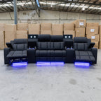 The Remi Four Seat Dual-Motor Electric Recliner Lounge - Jet - Floor Stock available to purchase from Warehouse Furniture Clearance at our next sale event.
