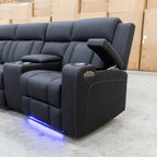 The Remi Four Seat Dual-Motor Electric Recliner Lounge - Jet - Floor Stock available to purchase from Warehouse Furniture Clearance at our next sale event.