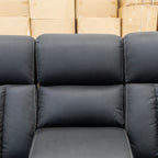 The Remi Four Seat Dual-Motor Electric Recliner Lounge - Jet - Floor Stock available to purchase from Warehouse Furniture Clearance at our next sale event.