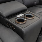 The Remi Four Seat Dual-Motor Electric Recliner Lounge - Jet - Floor Stock available to purchase from Warehouse Furniture Clearance at our next sale event.