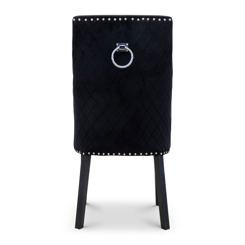 The Sienna Quilted Velvet Dining Chair - Onyx available to purchase from Warehouse Furniture Clearance at our next sale event.