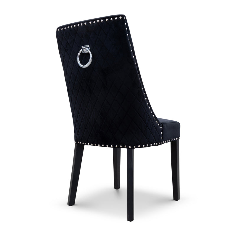 The Sienna Quilted Velvet Dining Chair - Onyx available to purchase from Warehouse Furniture Clearance at our next sale event.
