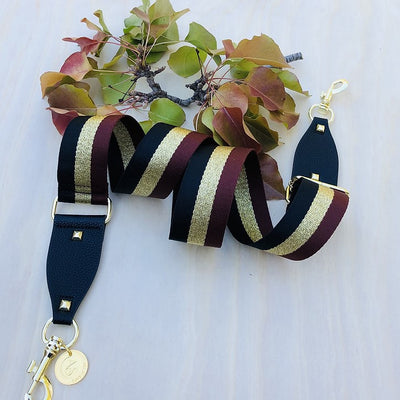 The Black, Gold & Brown Strip - Bag Strap - Gold Hardware available to purchase from Warehouse Furniture Clearance at our next sale event.