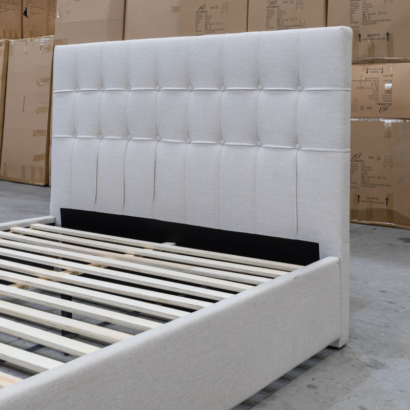 The Zara Double Upholstered Storage Bed - Oat White available to purchase from Warehouse Furniture Clearance at our next sale event.