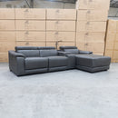 The Zenn Three Seater Chaise Electric Recliner Lounge – Storm Leather available to purchase from Warehouse Furniture Clearance at our next sale event.