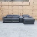 The Zenn Three Seater Chaise Electric Recliner Lounge – Storm Leather available to purchase from Warehouse Furniture Clearance at our next sale event.