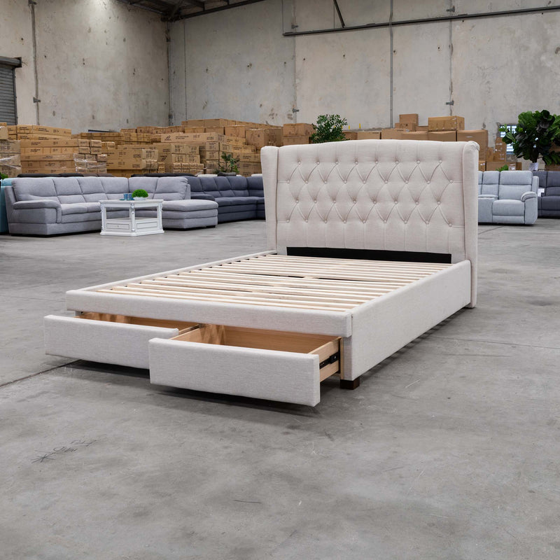 The Amelia Double Fabric Storage Bed - Oat White available to purchase from Warehouse Furniture Clearance at our next sale event.