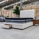 The Nora King Fabric Storage Bed - Oat White available to purchase from Warehouse Furniture Clearance at our next sale event.