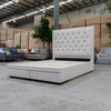 The Nora Queen Fabric Storage Bed - Oat White available to purchase from Warehouse Furniture Clearance at our next sale event.