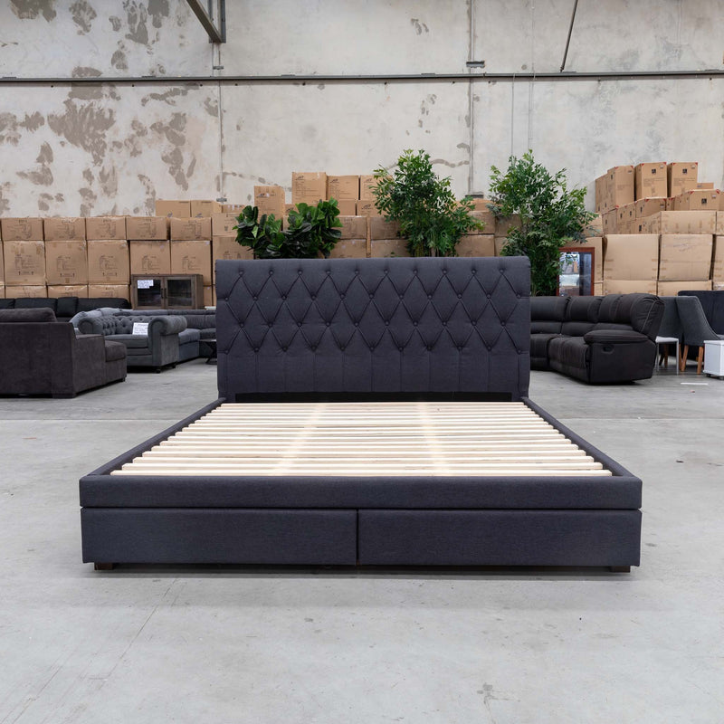 The Riley Queen Fabric Storage Bed - Mid Grey available to purchase from Warehouse Furniture Clearance at our next sale event.