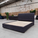 The Riley Queen Fabric Storage Bed - Mid Grey available to purchase from Warehouse Furniture Clearance at our next sale event.