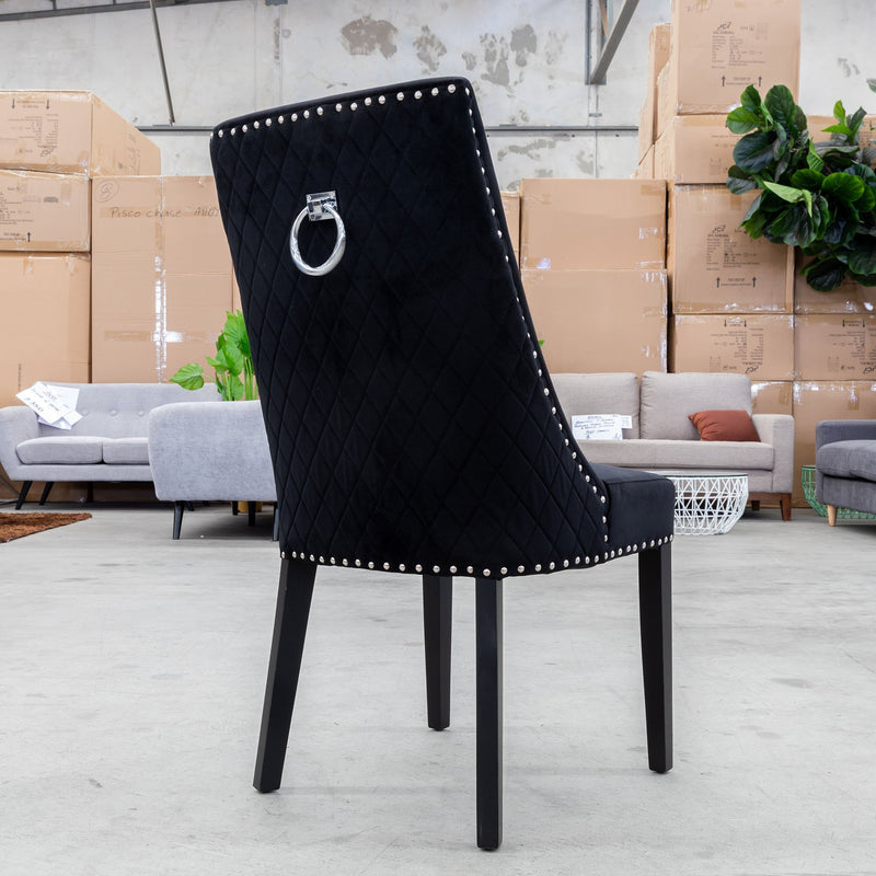 The Sienna Quilted Velvet Dining Chair - Onyx available to purchase from Warehouse Furniture Clearance at our next sale event.
