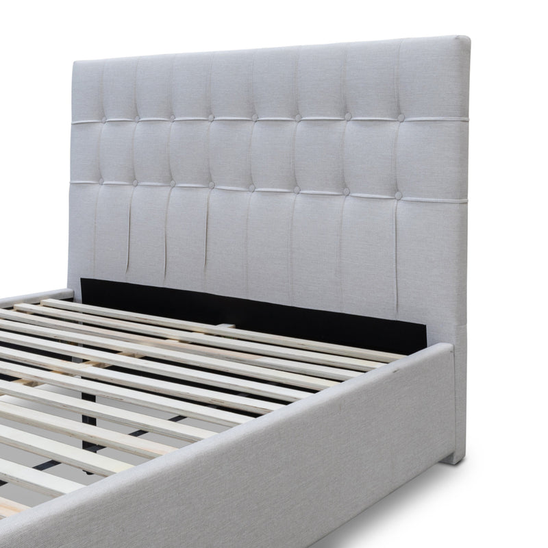 The Zara Double Upholstered Storage Bed - Oat White available to purchase from Warehouse Furniture Clearance at our next sale event.